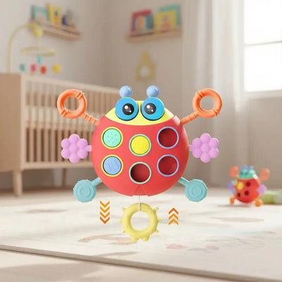 Juguete sensorial Montessori mariquita tirable para bebés